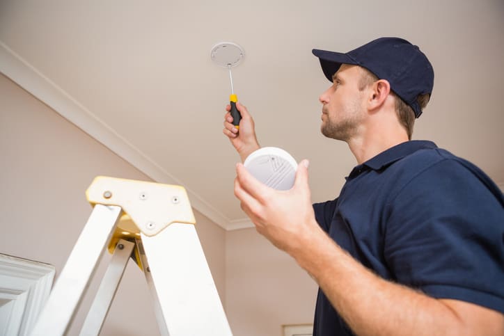 Handyman installing smoke detector | Allfire Services | Rock Hill SC |